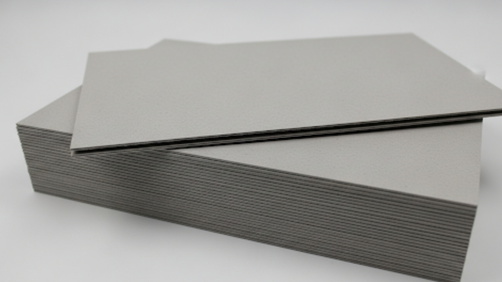 High-quality Recycled Board sheets stacked for sustainable packaging and stationery solutions.