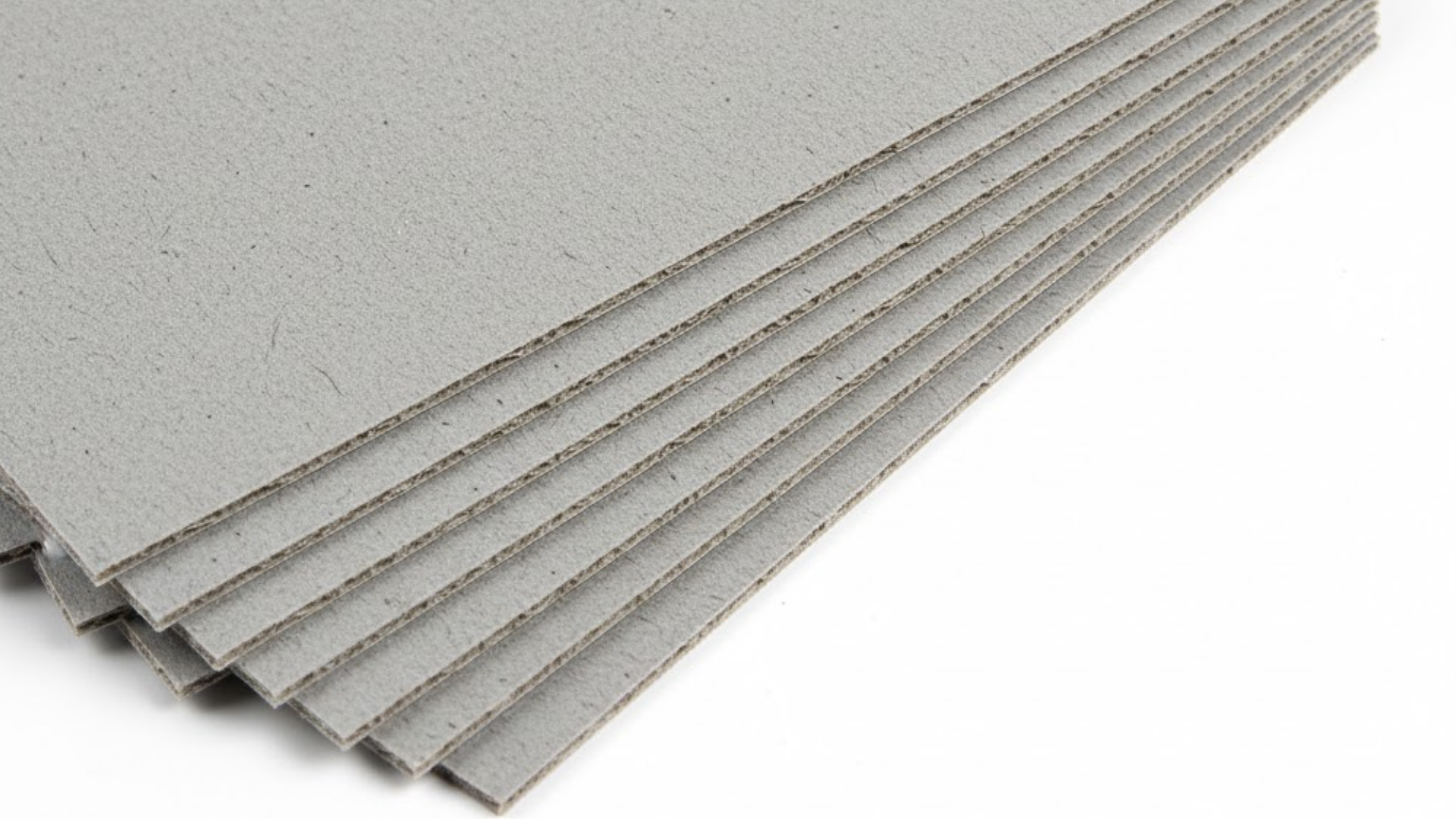 Stack of premium Paper Board sheets used for custom packaging and printing solutions.